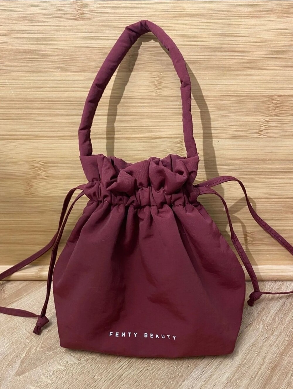 Fenty Beauty Makeup Drawstring Handbag — Burgundy